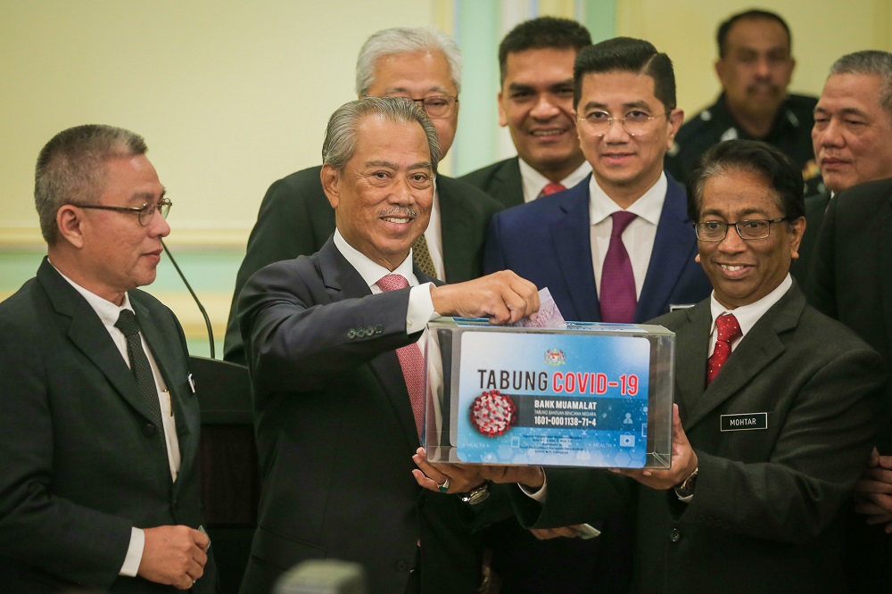 Prime Minister Tan Sri Muhyiddin Yassin launches the Covid-19 Relief Fund at the Prime Minister Office’s in Putrajaya March 11, 2020. — Picture by Yusof Mat Isa