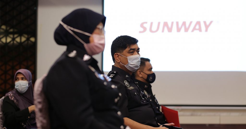 police officers awaiting their vaccinations