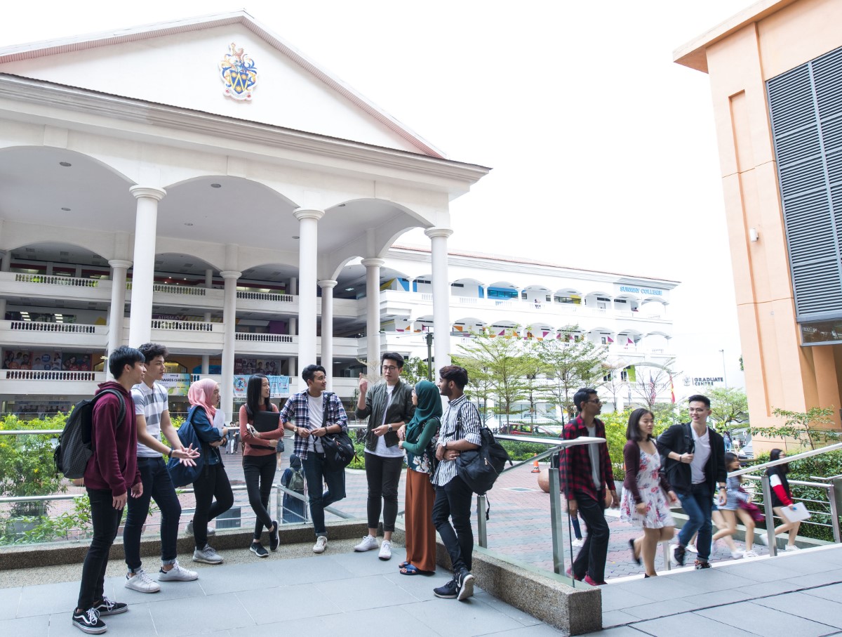 Students gathered around in an open discussion at Sunway University’s lobby