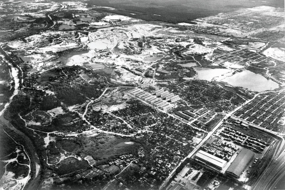 A black-and-white drone shot of the tin-mining wasteland (now SCKL) in 1974.