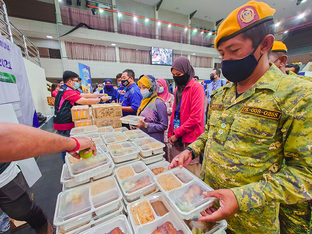 Frontline workers collecting their nutritious packed meals