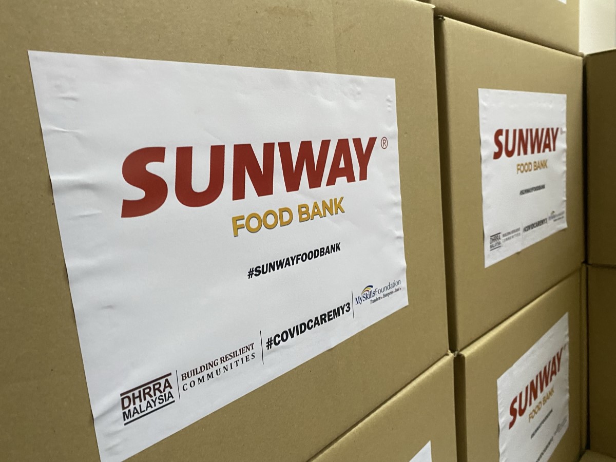 A close-up shot of #SunwayforGood food bank boxes, stacked neatly atop one another