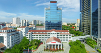 A high-angle shot of Menara Sunway featuring different buildings within Sunway City Kuala Lumpur at the background