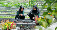 A wide shot of two students at SMK Bandar Sunway