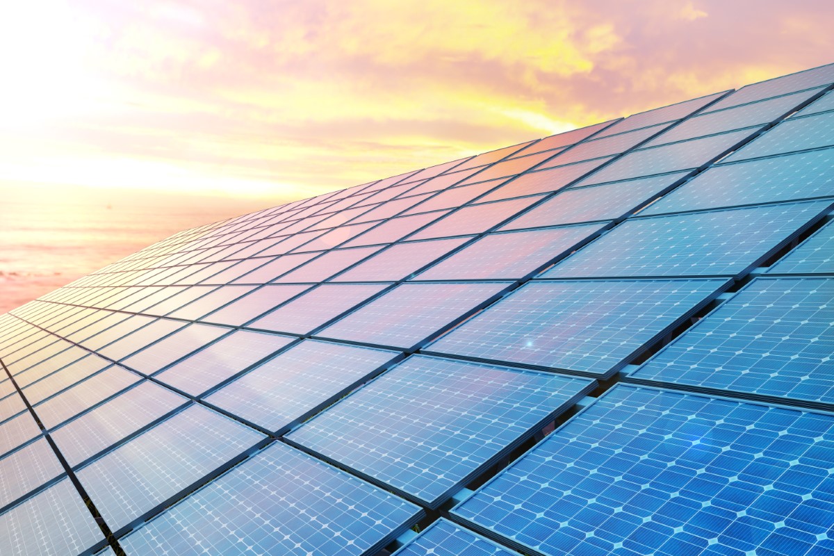 A close-up on solar panels by the sunset