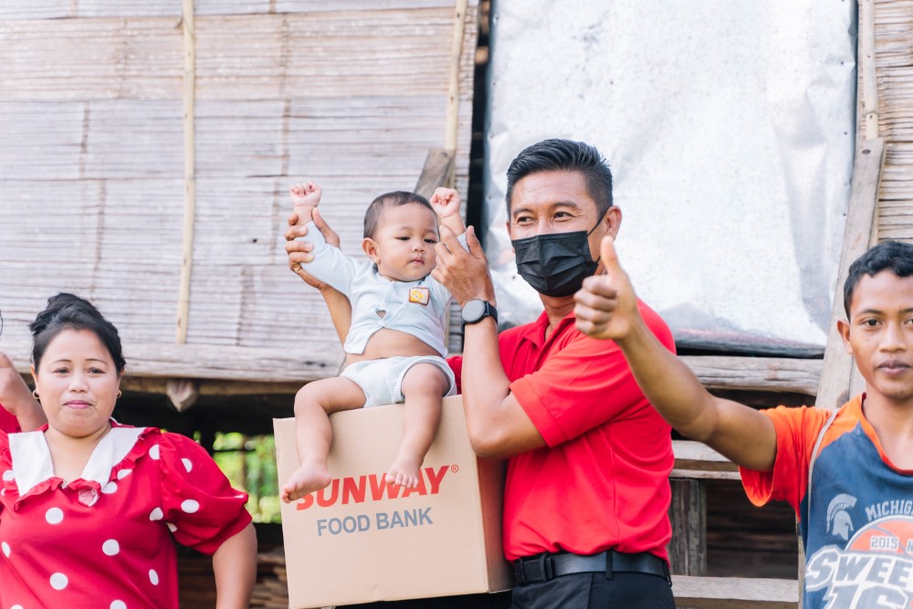 A candid shot of Sunway spokesperson at a CSR initiative