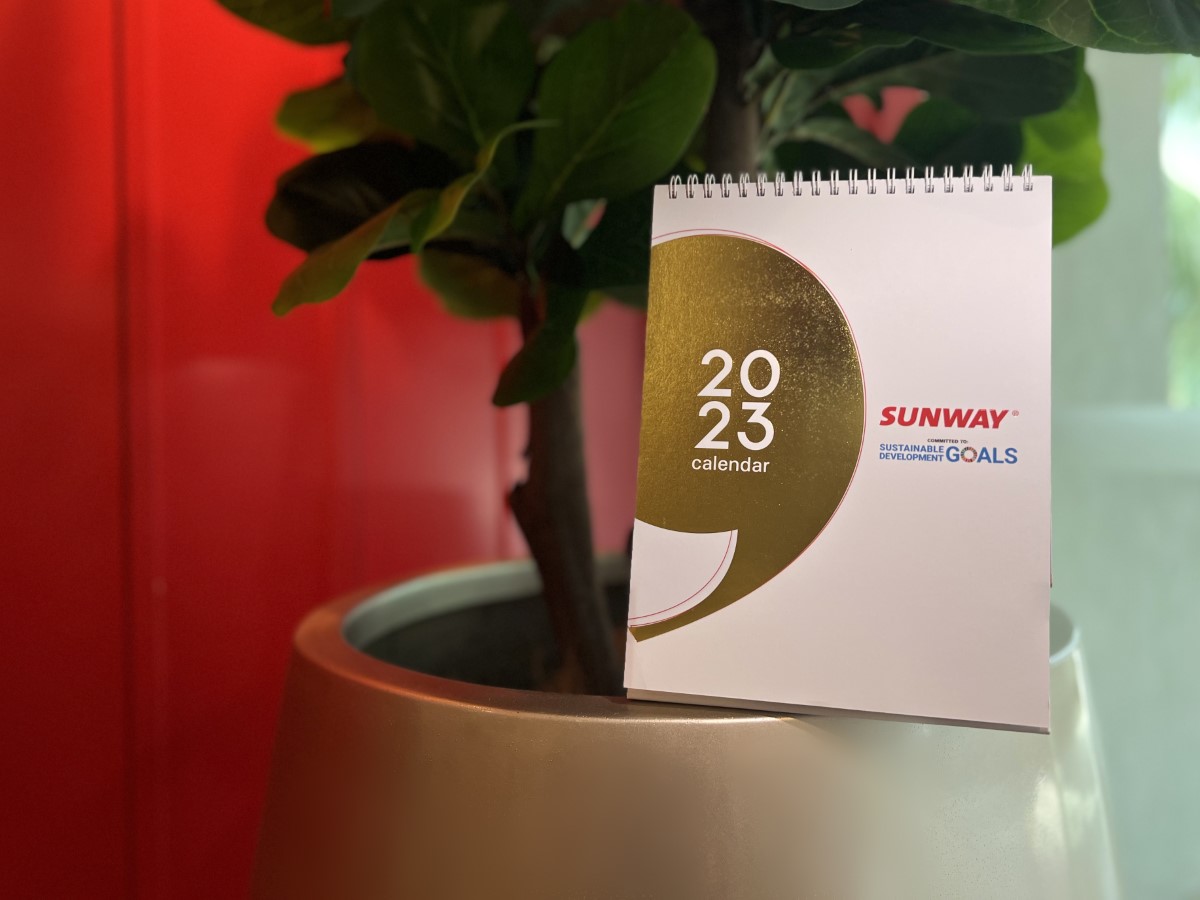 Sunway’s 2023 calendar placed on top of a potted plant