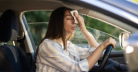 Candid shot of a lady wiping her face