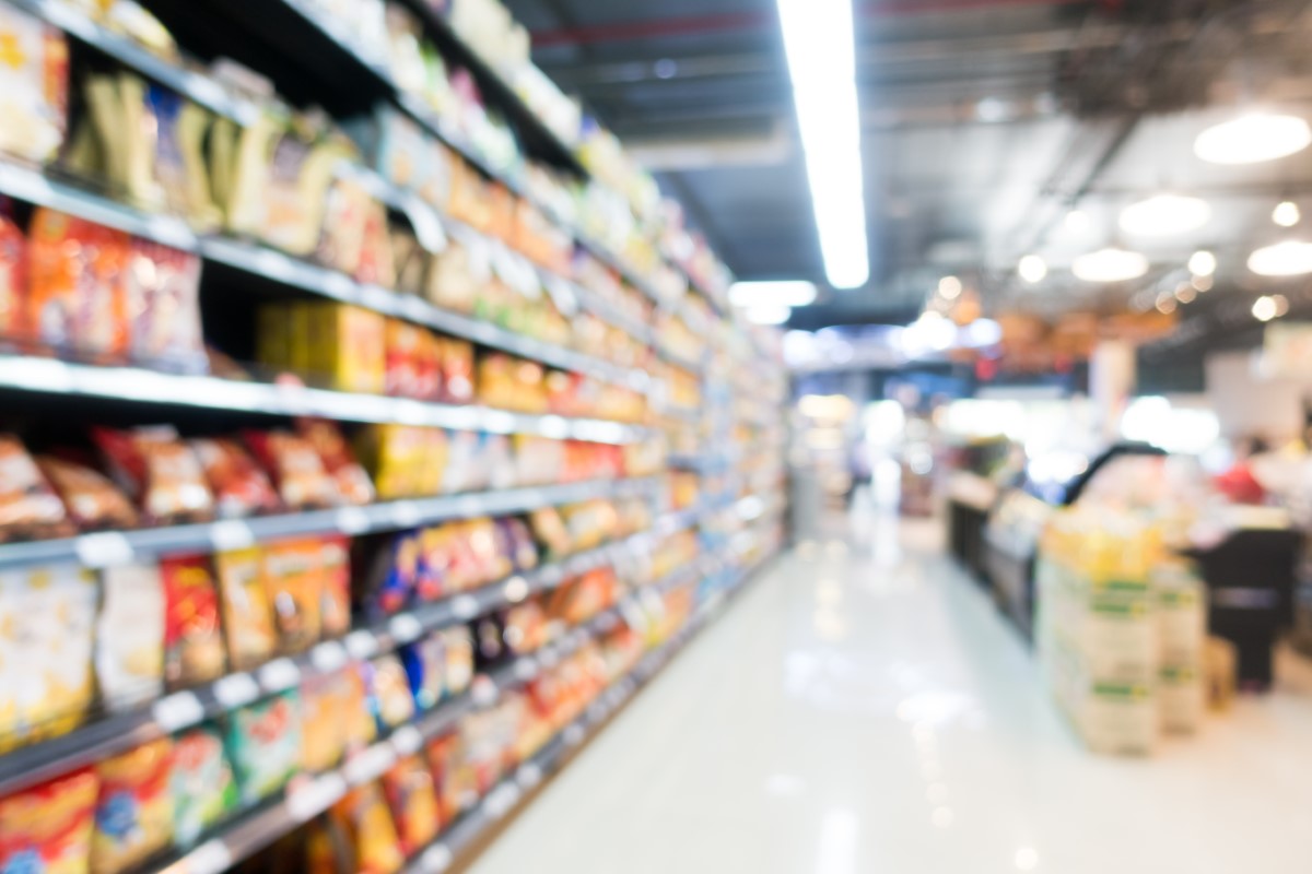 An abstract blur shot of a grocery store and shelves