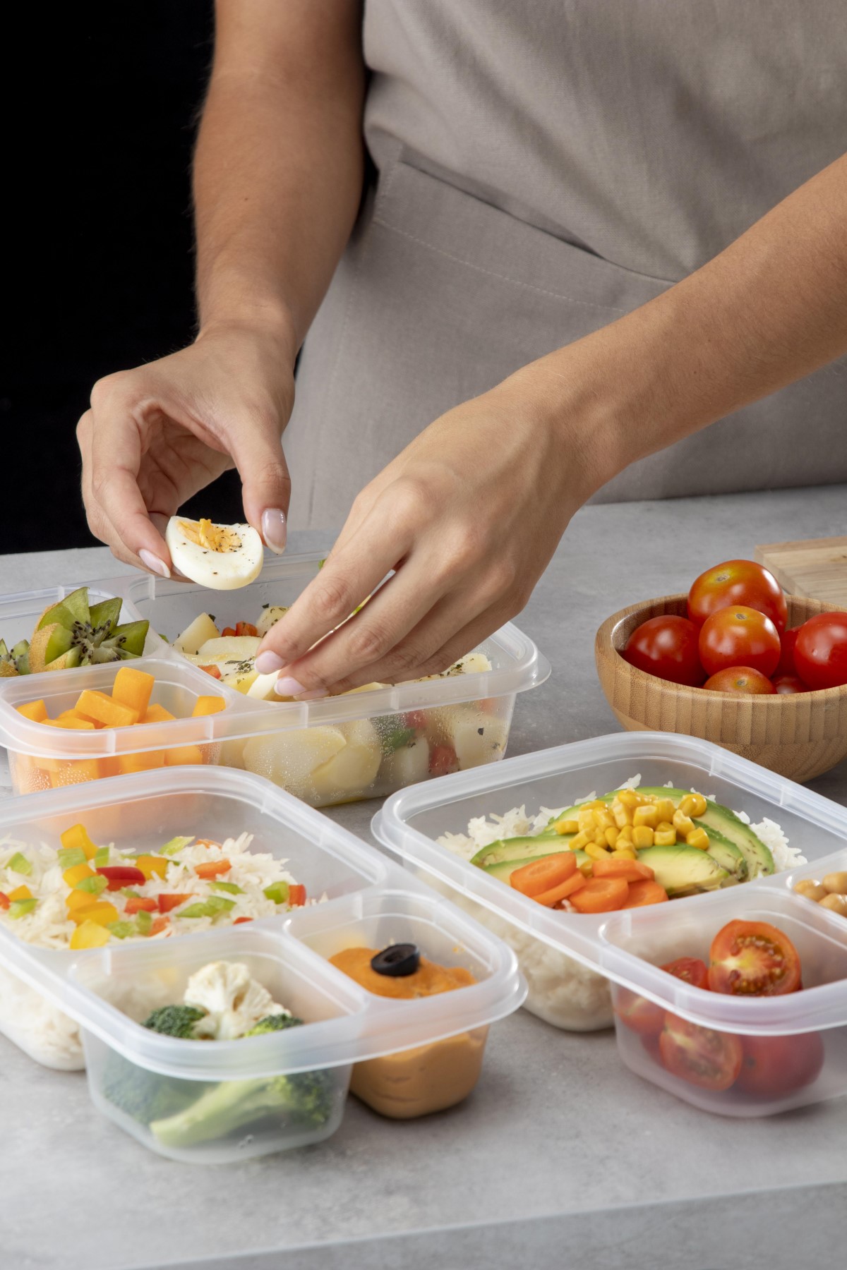 Hand shot of a person cooking and meal prepping with healthy food