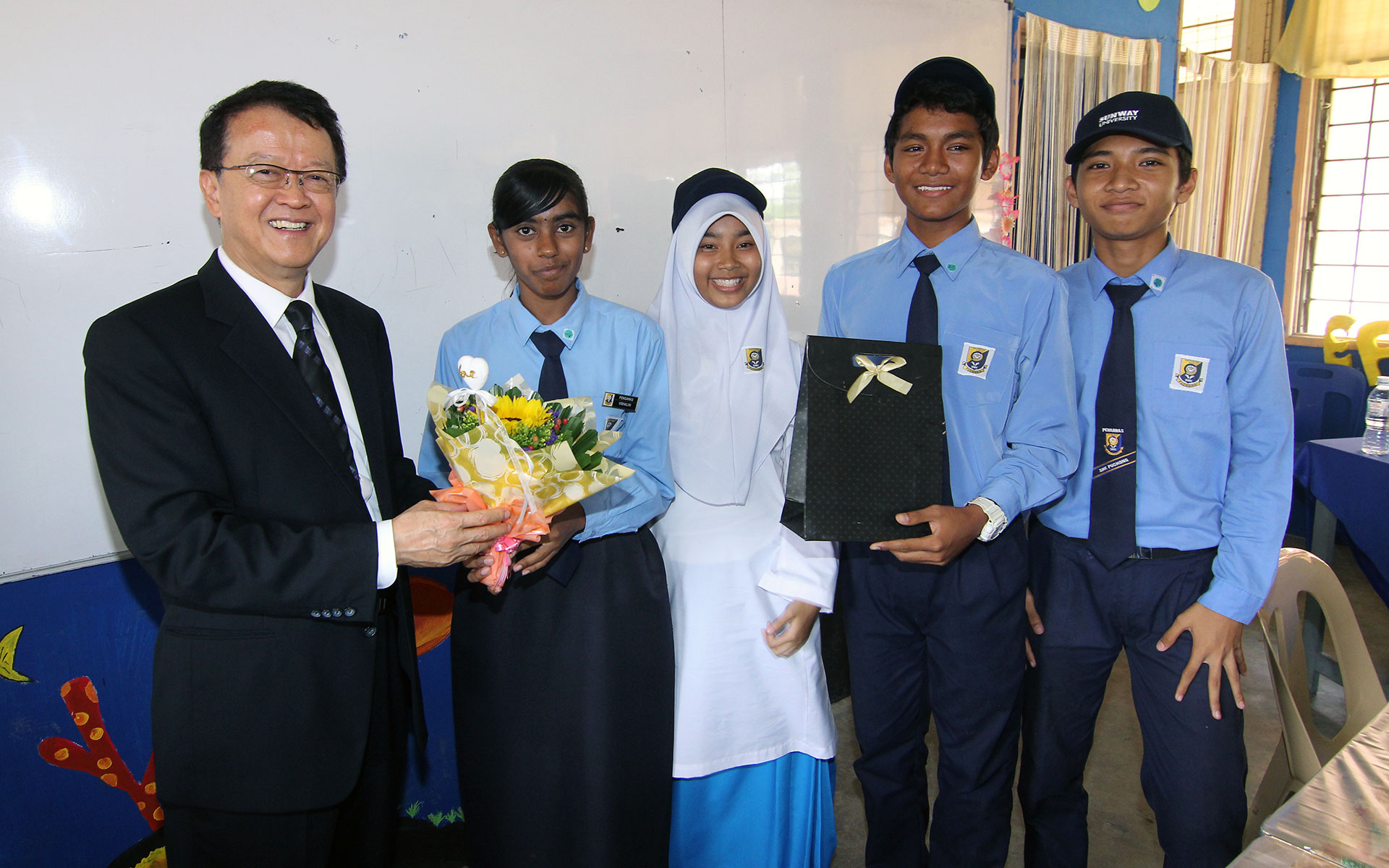 Cheah (left), pictured here with students during Teach for Malaysia week, has been named by Forbes in its “Asia’s Heroes of Philanthropy” list for the fourth time.